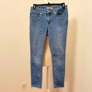 LEVI'S light wash 711 Skinny jeans w/ metal embellishments on pockets in size 27